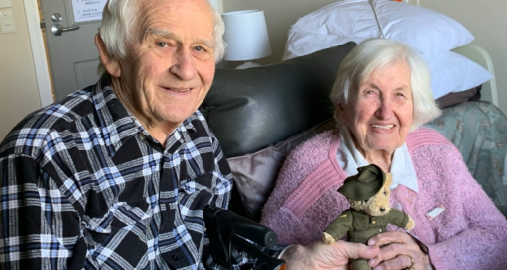 Ern and Betty Carter receiving a 2020 Legacy Week bear